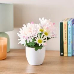Artificial Floral Arrangement In White Ceramic Plant Pot -Home Decor Shop 30960663